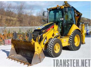 - Caterpillar 428 E   