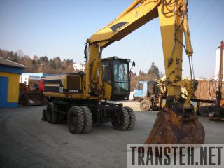 CAT M 320-  -