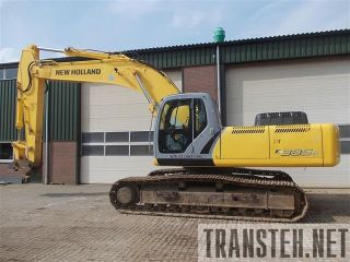 New Holland E385B lc-  -
