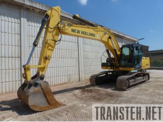   New Holland E 305 C -