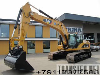    Caterpillar 325  329  -