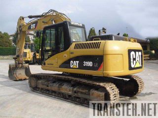    Caterpillar 319 -