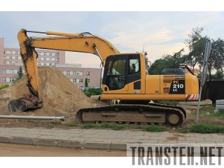    Komatsu -