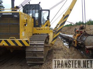      Komatsu D85 -
