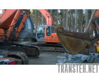    Hitachi Komatsu /    