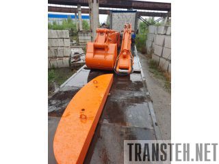   (/)   Komatsu 